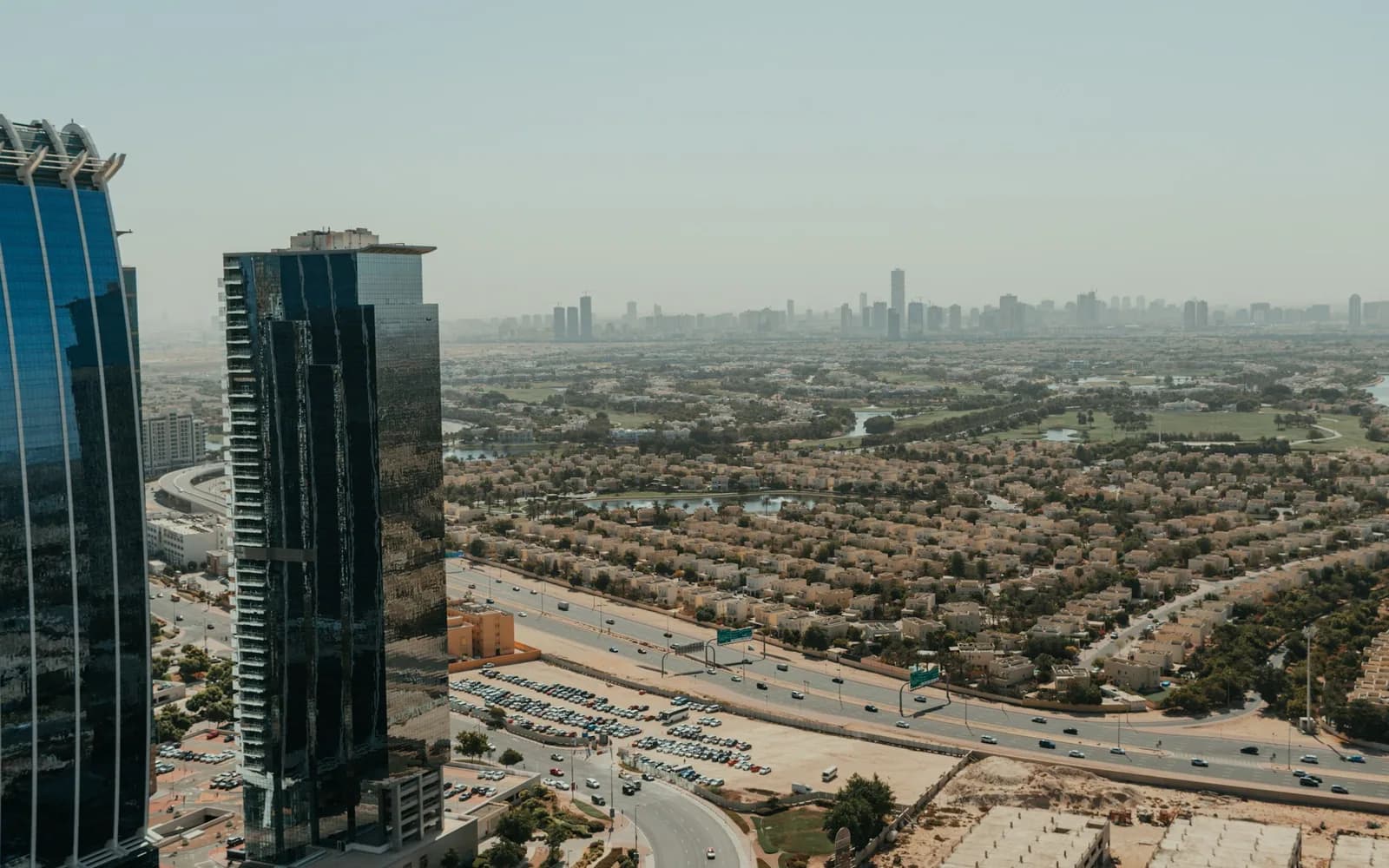 Villa community beside high-rise towers in Dubai