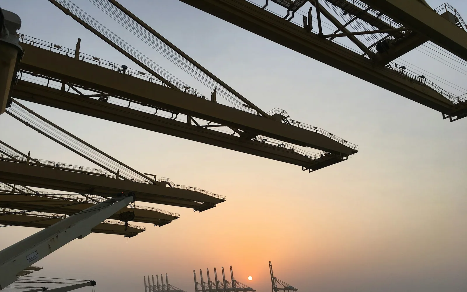 Cranes at Jebel Ali port at sunset